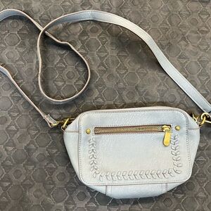 Chic Soft Blue Crossbody Bag with Gold Accents